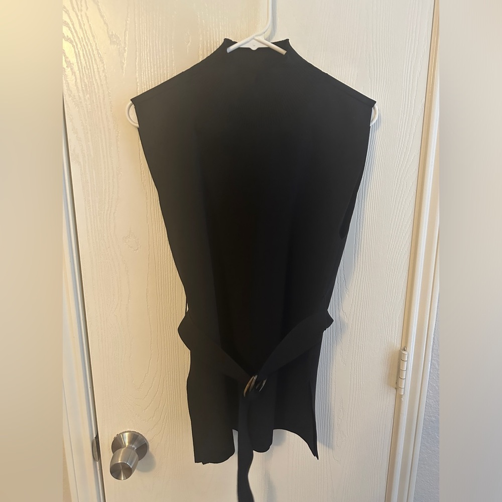 Black mock neck belted top